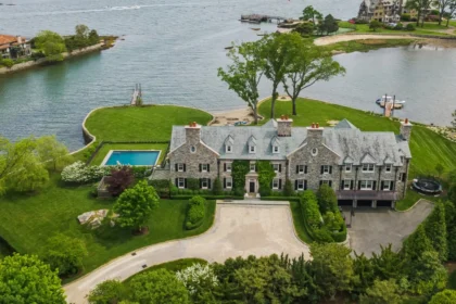 The most expensive house in Greenwich, Connecticut, known as the ‘city of billionaires,’ is on the market for $49.5 million. This waterfront home features six bedrooms, a private beach, and luxurious amenities, offering spectacular views and timeless architecture.