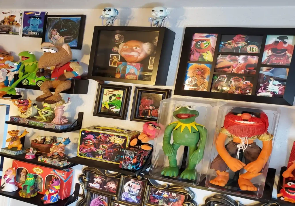 A Muppets superfan, Jayden Libran, 25, from Los Angeles, has amassed a collection of over 1,500 items worth £40,000. His collection includes puppets, figures, posters, and more.