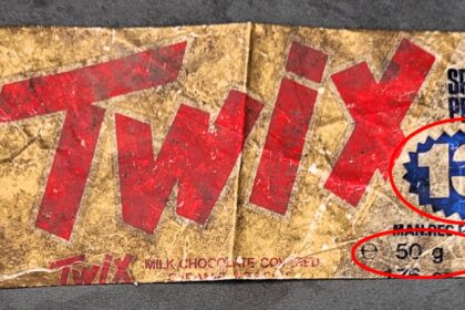 A 42-year-old Twix wrapper found intact in a garden highlights price and logo changes over decades, sparking nostalgia and surprise at its enduring condition.
