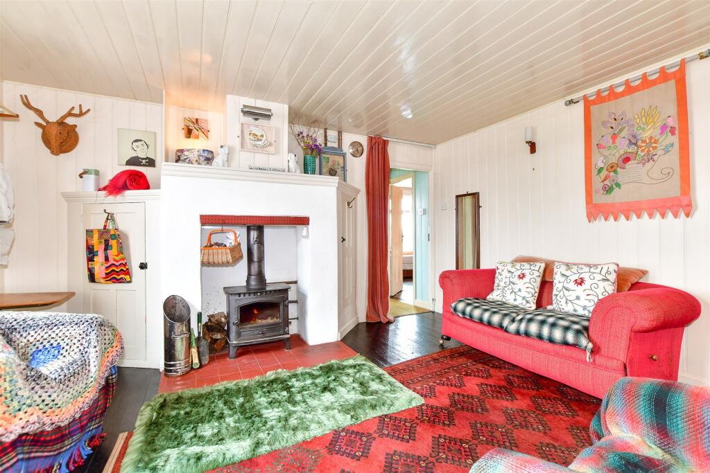 Own a detached bungalow in Britain's only desert, Dungeness, with stunning views and quirky charm. Experience isolation and atmosphere for £875k.