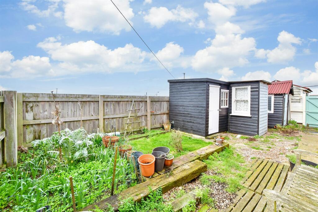 Own a detached bungalow in Britain's only desert, Dungeness, with stunning views and quirky charm. Experience isolation and atmosphere for £875k.