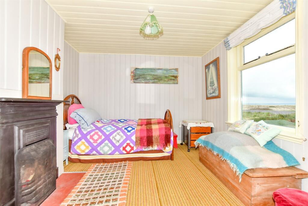 Own a detached bungalow in Britain's only desert, Dungeness, with stunning views and quirky charm. Experience isolation and atmosphere for £875k.