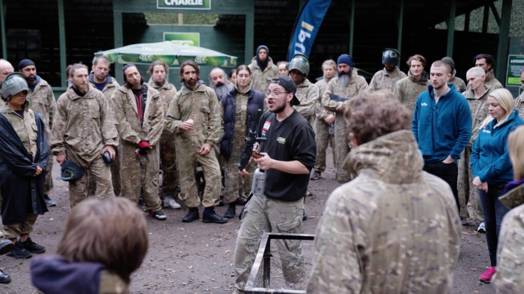 Mark ‘Billy’ Billingham leads ex-military trio in intense paintball challenge against 100 participants, backed by British Forces Broadcasting Service.