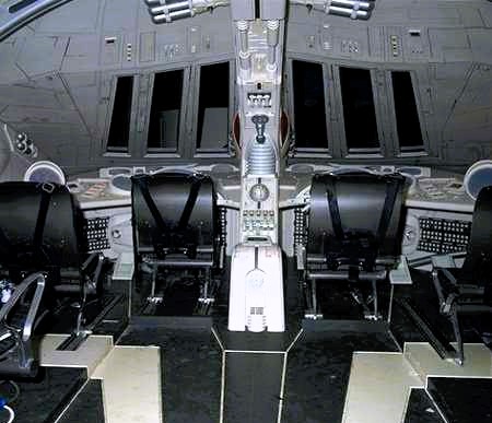 An original chair from Star Wars: The Phantom Menace, used in the cockpit scenes of the J-type 327 Nubian Royal Starship, is up for auction. Obtained directly from set manager David Bubbs.