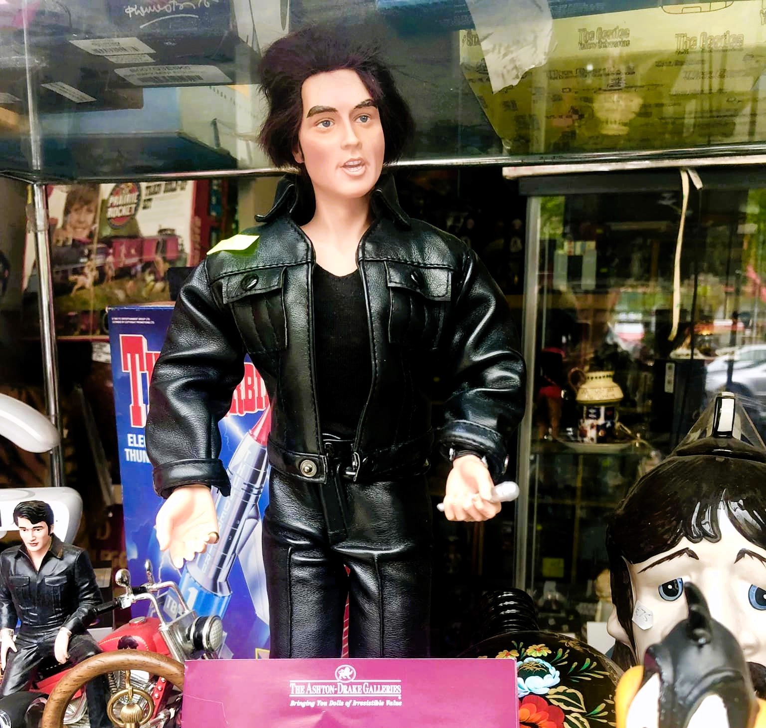 A charity shop's attempt to sell a life-size Elvis Presley doll falls flat as its lack of resemblance to the King of Rock 'n' Roll sparks ridicule and disbelief.