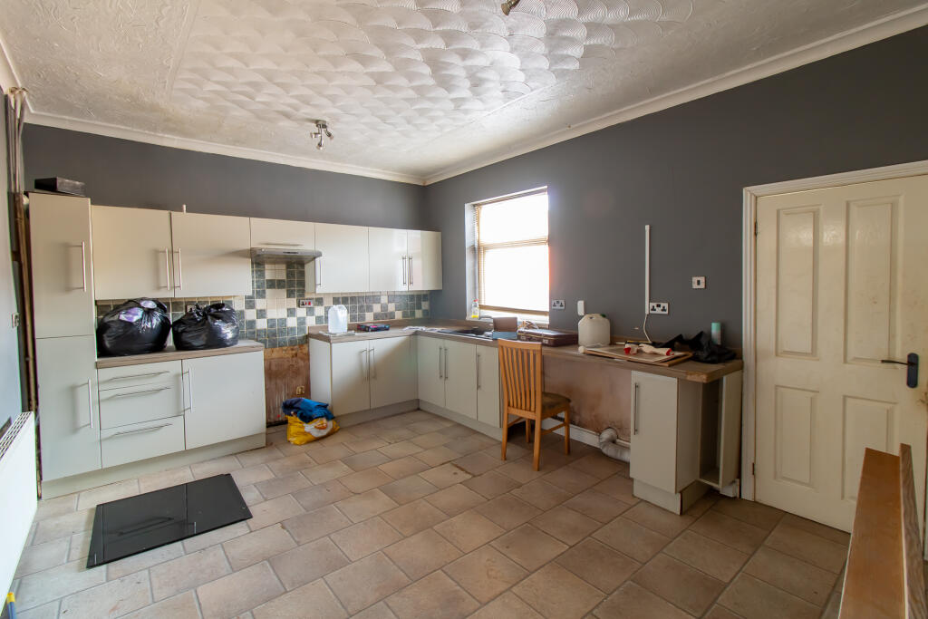 A three-bedroom terraced house in Peterlee, County Durham, is on sale for just £10,000. Despite its unlucky address at 13 Thirteenth Street, it offers great potential for buyers.