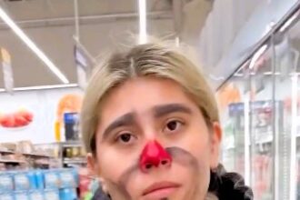 A man's TikTok video went viral after he painted his girlfriend's face like a clown while she slept, resulting in a hilarious shopping trip where she unknowingly garnered attention for her unusual look.