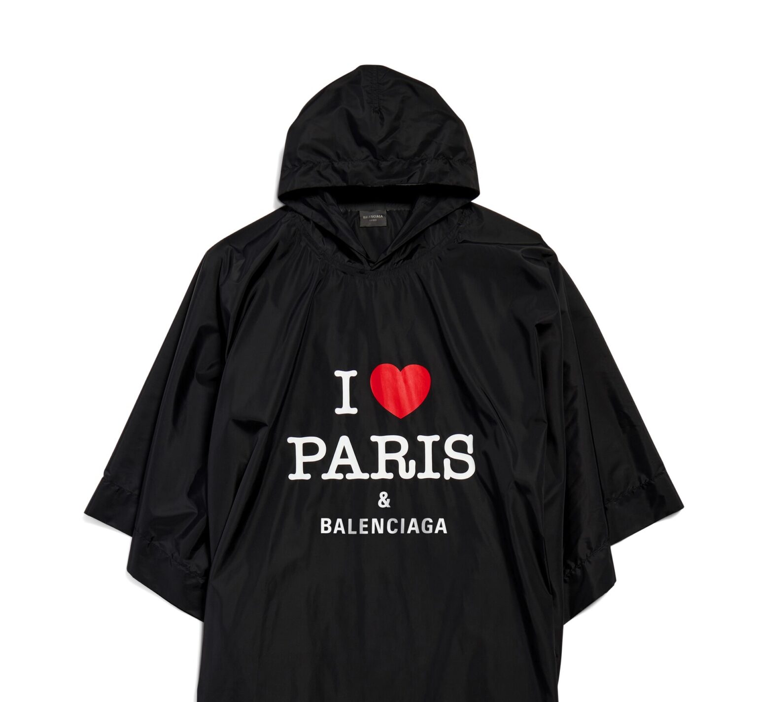 Balenciaga's new 'I love Paris' collection features high-priced tourist souvenirs, including a £1,150 poncho and £70 postcards, mimicking holiday tat with a luxurious twist