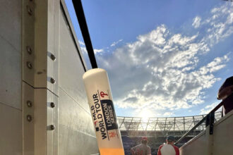 Fans are outraged by the £28.50 cost of a two-pint baseball bat drink at West Ham’s stadium during the MLB World Tour, despite enjoying the Phillies vs. Mets game.