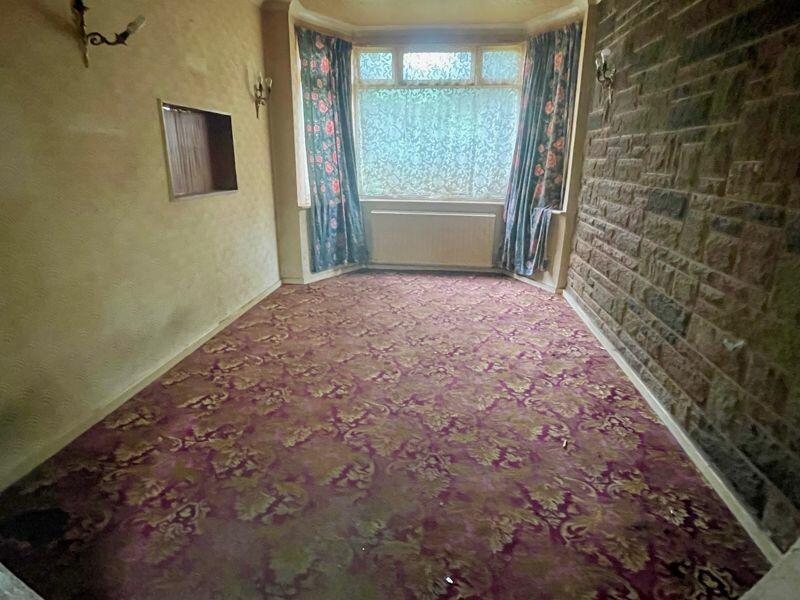 A Birmingham house for £220,000 surprises social media with a "time portal" hole connecting two rooms. Discover this unique feature and why it’s causing a buzz online!