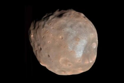 Phobos, Mars' "space potato" moon, is on a collision course with the Red Planet, set to crash in 50 million years. Its lumpy shape and viral image spark online jokes.