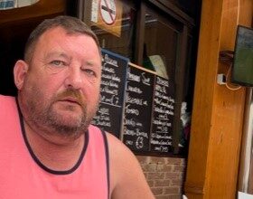 Brit finds the cheapest pint in Benidorm at just 86p. Graham and his friend Darren enjoy pints of Estrella at a local bar, praising its quality and budget-friendly prices.