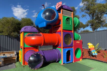 A couple in Australia built a McDonald's playground in their garden for their kids after finding it on eBay for £2,600. The fun-themed yard includes a playhouse, skate park, and more.