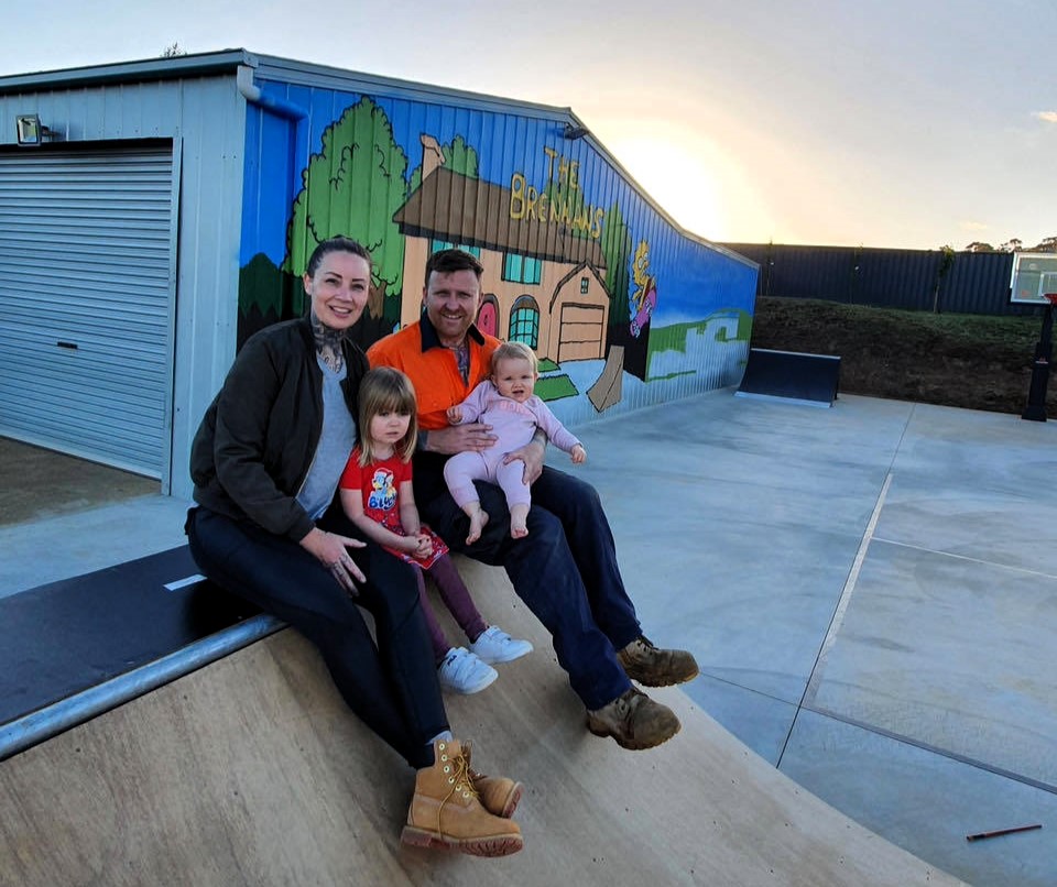 A couple in Australia built a McDonald's playground in their garden for their kids after finding it on eBay for £2,600. The fun-themed yard includes a playhouse, skate park, and more.