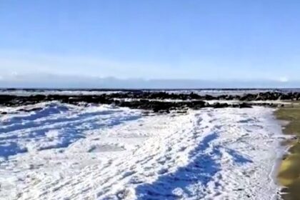 Frozen waves stand rigid near San Sebastián, Argentina, after record-low temperatures. Locals describe the surreal phenomenon as both beautiful and worrying. Video goes viral.