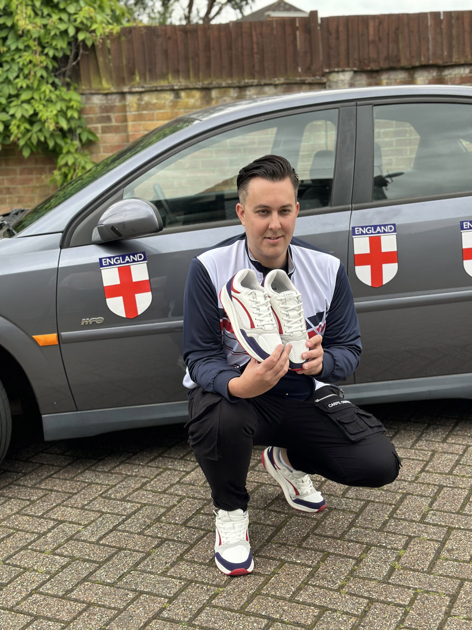 England fans Robbie Thompson and Dan McGladdery drive 2,500 miles in a £650 Vauxhall Vectra to support the Three Lions at Euro 2024. Follow their adventurous journey and insights.