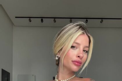 Heavily pregnant model Chiara Nasti, wife of footballer Mattia Zaccagni, faces backlash over chest and baby bump cast video, but receives support from her artist Marcella Loffredo.