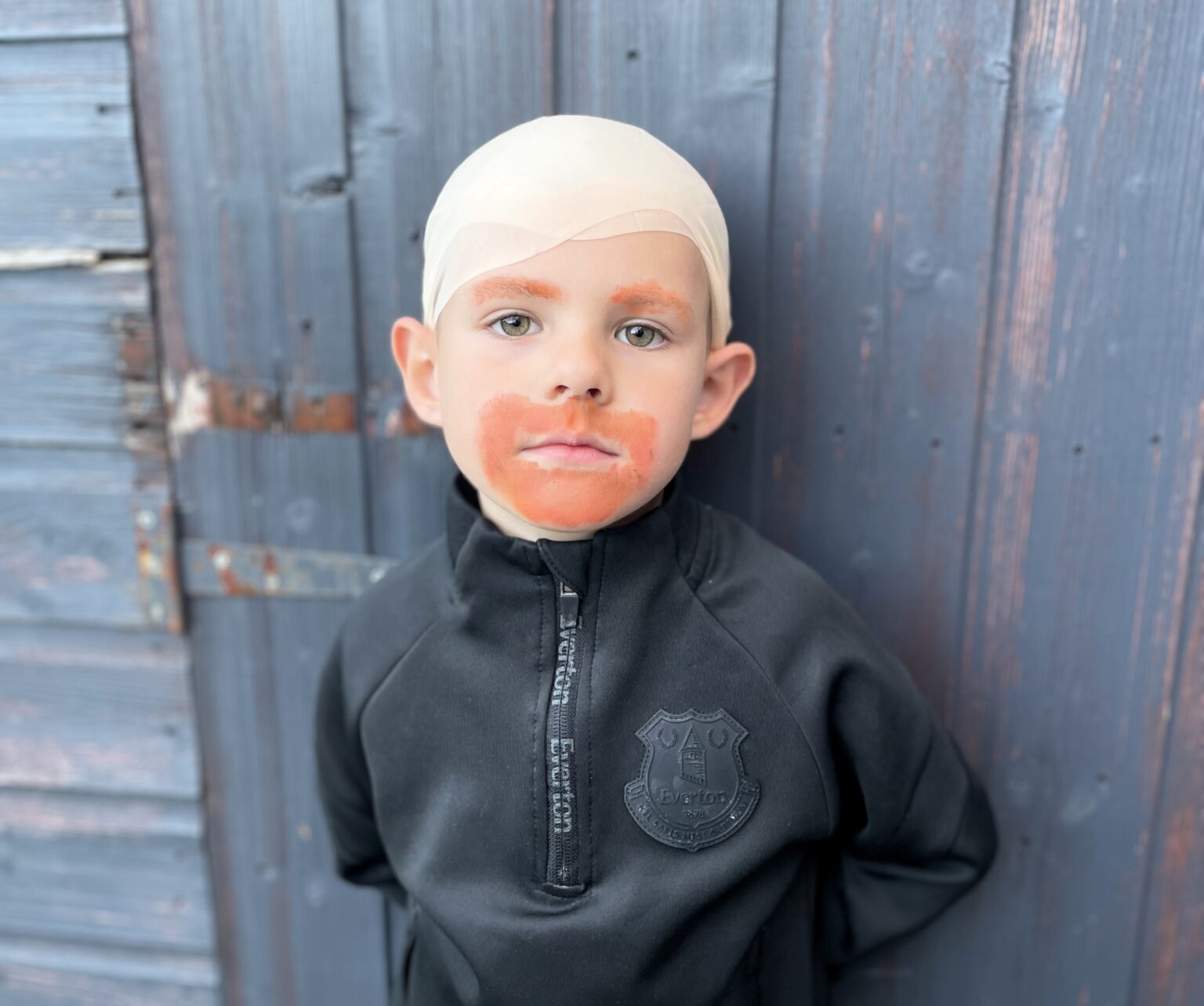 A five-year-old boy surprises teachers by dressing up as Everton manager Sean Dyche for sports week, opting for a unique look instead of the usual footballer attire.