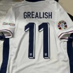 Frustrated fans sell their new England shirts with 'Grealish' on Vinted and eBay after he was dropped from the Euro 2024 squad, causing jerseys to plummet in value.