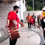 A German granny silences a Turkish fan's drum with her walking sticks, protesting the noise before Turkey's 3-1 win against Georgia in Dortmund, leaving fans in stitches.