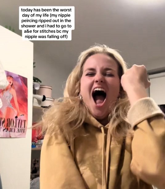 Woman's shower accident rips off half her nipple, goes viral on TikTok with 90,000 views. Despite the ordeal, she remains undeterred about future piercings.