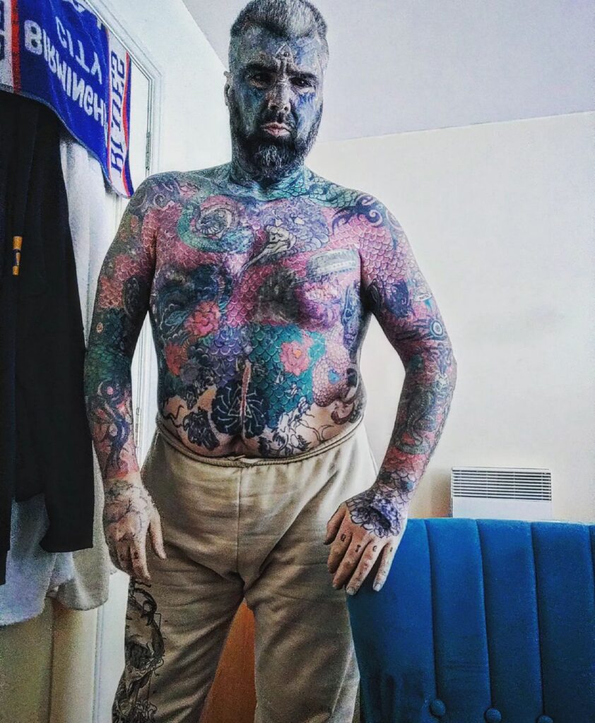 "Britain’s most tattooed man" shares his struggle to find love, often seen as a "fetish." Despite his unique look, he hopes to find a partner who truly appreciates him.