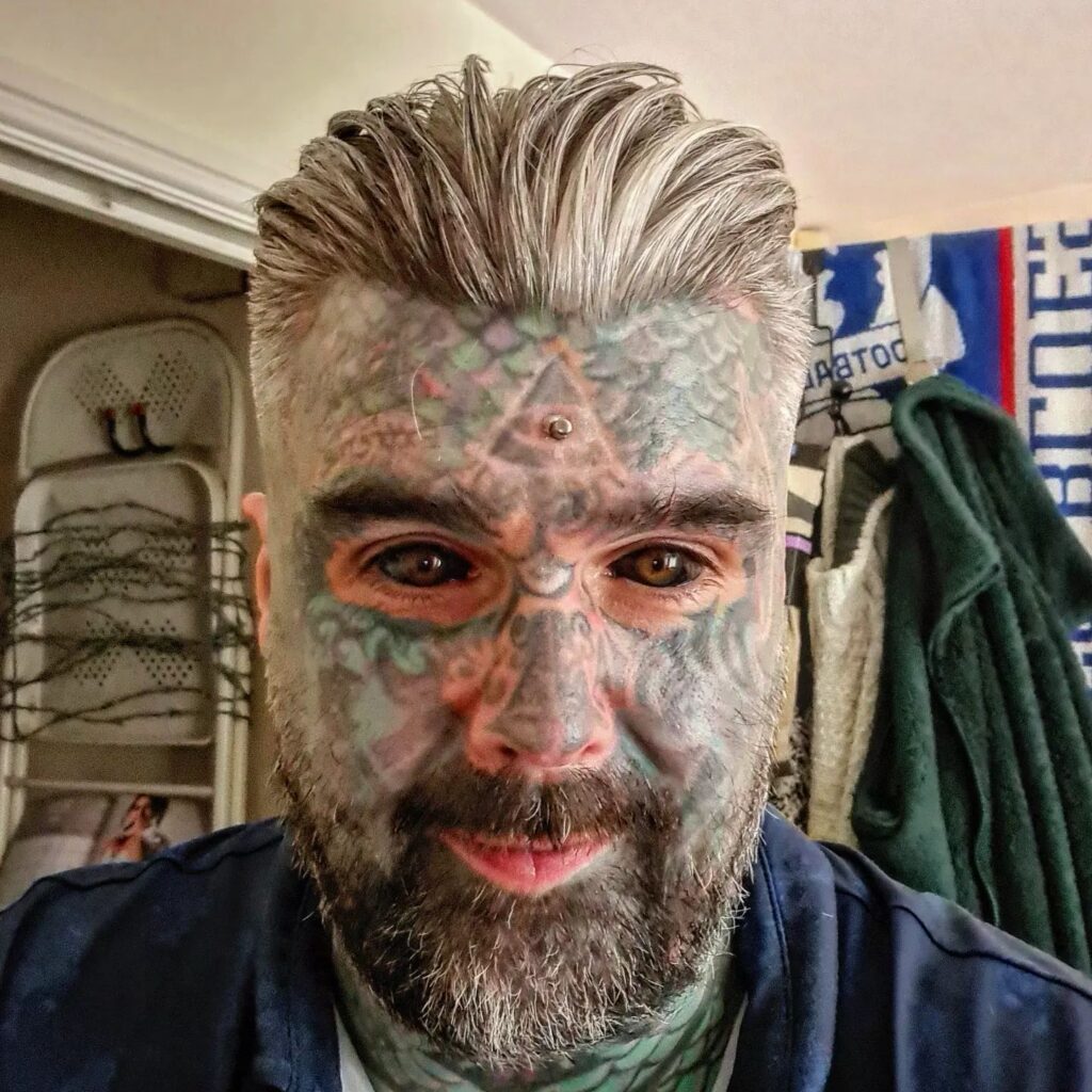 "Britain’s most tattooed man" shares his struggle to find love, often seen as a "fetish." Despite his unique look, he hopes to find a partner who truly appreciates him.