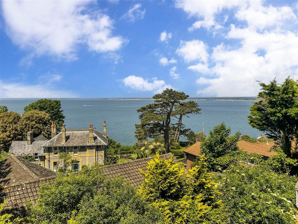 A unique mushroom-shaped home in Totland Bay, Isle of Wight, is on the market for £500,000. With panoramic sea views, a modern interior, and a garden terrace, it's a quirky dream home.