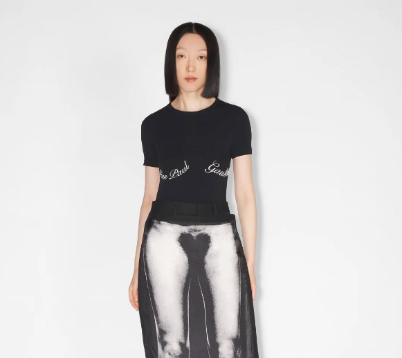 Jean Paul Gaultier sells an £870 skirt and £565 jeans that create an optical illusion of nudity. Part of the Fashion Fiction Collection, these unique pieces spark mixed reactions.
