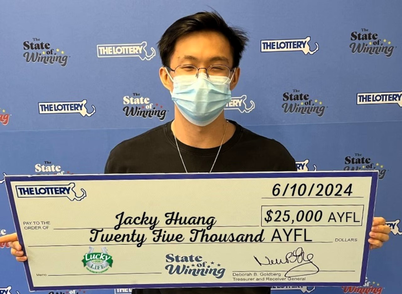 Massachusetts man wins £20,000 a year for life on the lottery using family birthdays. Jacky Huang plans to pay off college fees with his Lucky for Life prize.