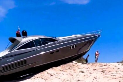 Luxury speedboat crashes into S'Espalmador islet, marooning it on a sand dune. Emergency services respond swiftly; crew unharmed. Removal efforts underway to protect the environment.