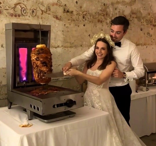 A newly-wed couple in Oaxaca, Mexico, ditches traditional wedding cake for a unique kebab-cutting ceremony, delighting guests and making unforgettable memories.