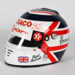 Nigel Mansell's F1 memorabilia auction fetched £55,000, far less than the expected £117,000. Highlights included a signed helmet and a rare photo of four F1 champions.