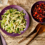 Nigella Lawson surprises fans with her unusual chicken and bean salad combination, praised by some including Alan Carr. The dish costs £22.72, feeds four, and takes 15 minutes to make.