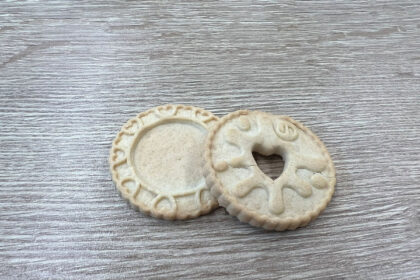 A British biscuit lover found a Jammie Dodger with no jam, sparking social media hilarity. The company apologized, promising tastier, fruitier jam in future batches.