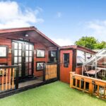 A three-bedroom semi-detached house in Kilwinning, Scotland, featuring indoor and outdoor home-bar spaces, hits the market for £89,000. Perfect for hosting and enjoying summer fun!