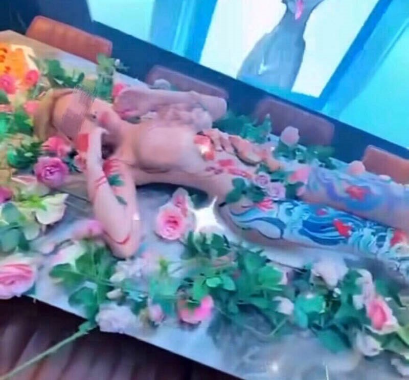 A diner in Taichung, Taiwan, stumped by a £1,456 sushi feast served on a naked model. The practice, known as 'Nyotaimori,' faces criticism and health concerns. Inspection pending.A diner in Taichung, Taiwan, stumped by a £1,456 sushi feast served on a naked model. The practice, known as 'Nyotaimori,' faces criticism and health concerns. Inspection pending.