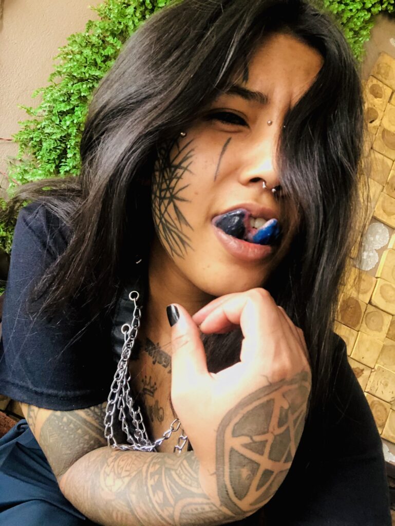 A 26-year-old embraces extreme body modifications, including black eyeball tattoos, despite her family's concerns. The Nepalese tattoo artist loves her unique look and plans more transformations.