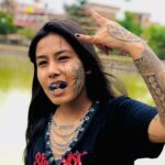 A 26-year-old embraces extreme body modifications, including black eyeball tattoos, despite her family's concerns. The Nepalese tattoo artist loves her unique look and plans more transformations.