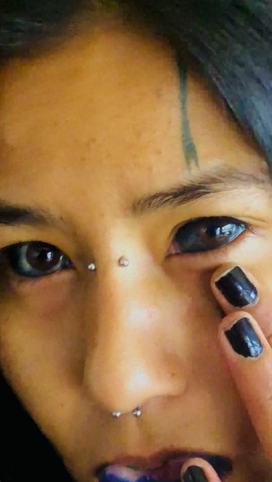 Anu Karki, 26, embraces extreme body modifications, including black eyeball tattoos, despite her family's concerns. The Nepalese tattoo artist loves her unique look and plans more transformations.