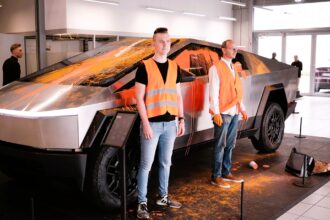 Climate activists from the Last Generation Group doused a Tesla Cybertruck in orange paint, protesting its environmental impact. The viral incident occurred in Hamburg, Germany.