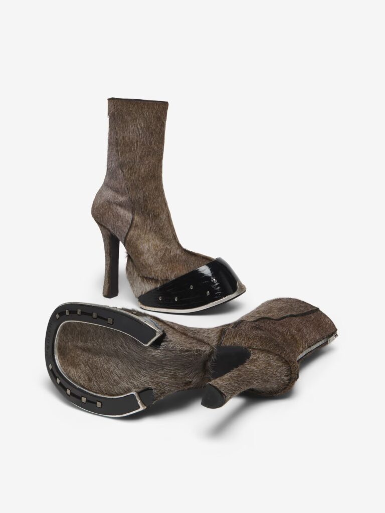 Alexander McQueen's latest design, the £2,190 "Women's Hoof Boot in Brown," features fur and hoof-inspired soles, perfect for horse lovers or fancy dress parties.