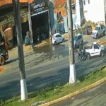 A biker crashed into a truck on the BR-262 highway in Manhuaçu, Brazil, and miraculously landed safely in the cargo bed. The biker was uninjured, but his motorcycle was damaged.