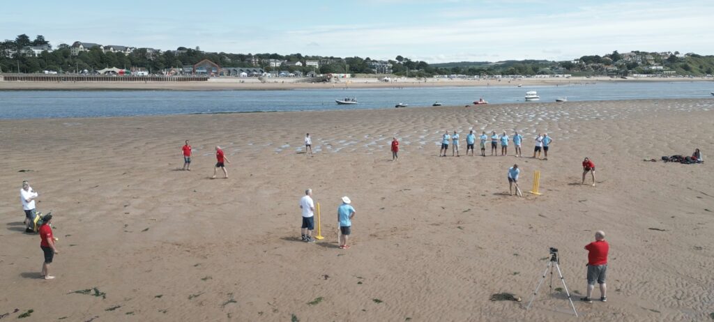 Britain's most unusual cricket match played on the River Exe estuary at low tide saw Exmouth RNLI beat Exmouth Freemasons by three runs. The unique event may become annual.