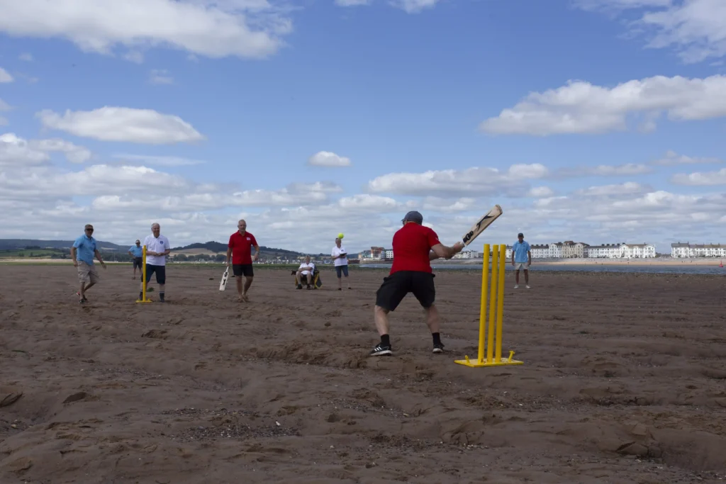 Britain's most unusual cricket match played on the River Exe estuary at low tide saw Exmouth RNLI beat Exmouth Freemasons by three runs. The unique event may become annual.