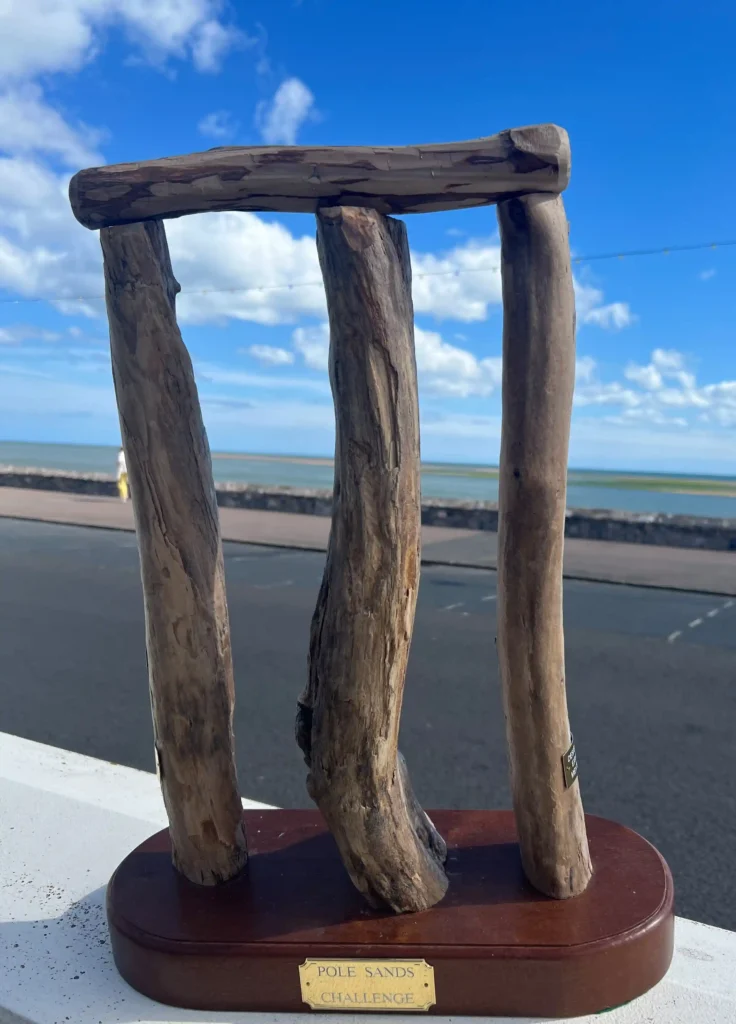 Britain's most unusual cricket match played on the River Exe estuary at low tide saw Exmouth RNLI beat Exmouth Freemasons by three runs. The unique event may become annual.