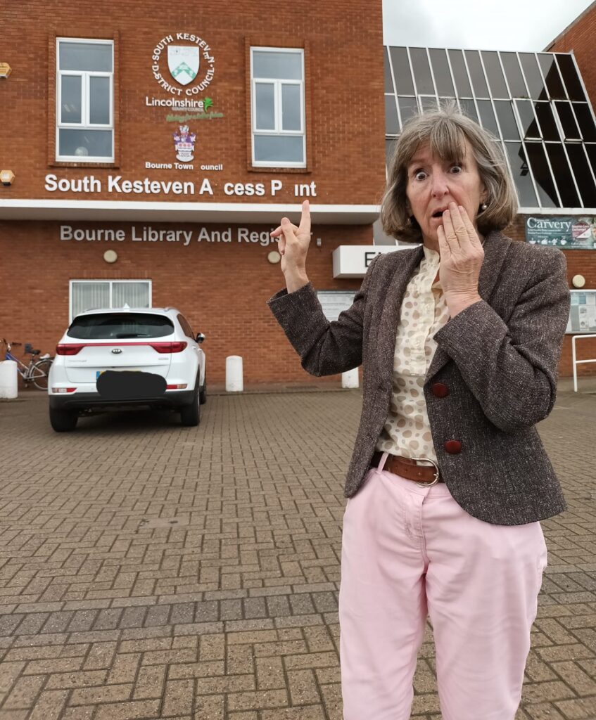 Council blunder leaves 'access point' sign reading 'a cess pint' after letters fall off building in South Kesteven, Lincolnshire. Locals react with humor and calls for repairs.