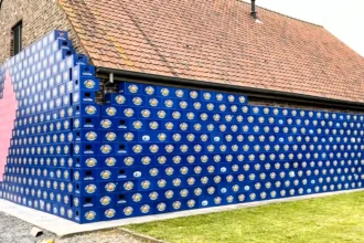 Newlyweds Jérémy Desmet and Maïté Beernaert returned home to find their house barricaded with 2,000 beer crates by friends, filled with Jérémy's favorite beer, in a hilarious tradition.