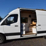 A couple shares their journey of transforming a van into a mobile home for £30,000, strengthening their relationship while traveling the world. Discover their adventure and tips!