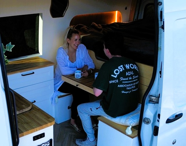 A couple shares their journey of transforming a van into a mobile home for £30,000, strengthening their relationship while traveling the world. Discover their adventure and tips!